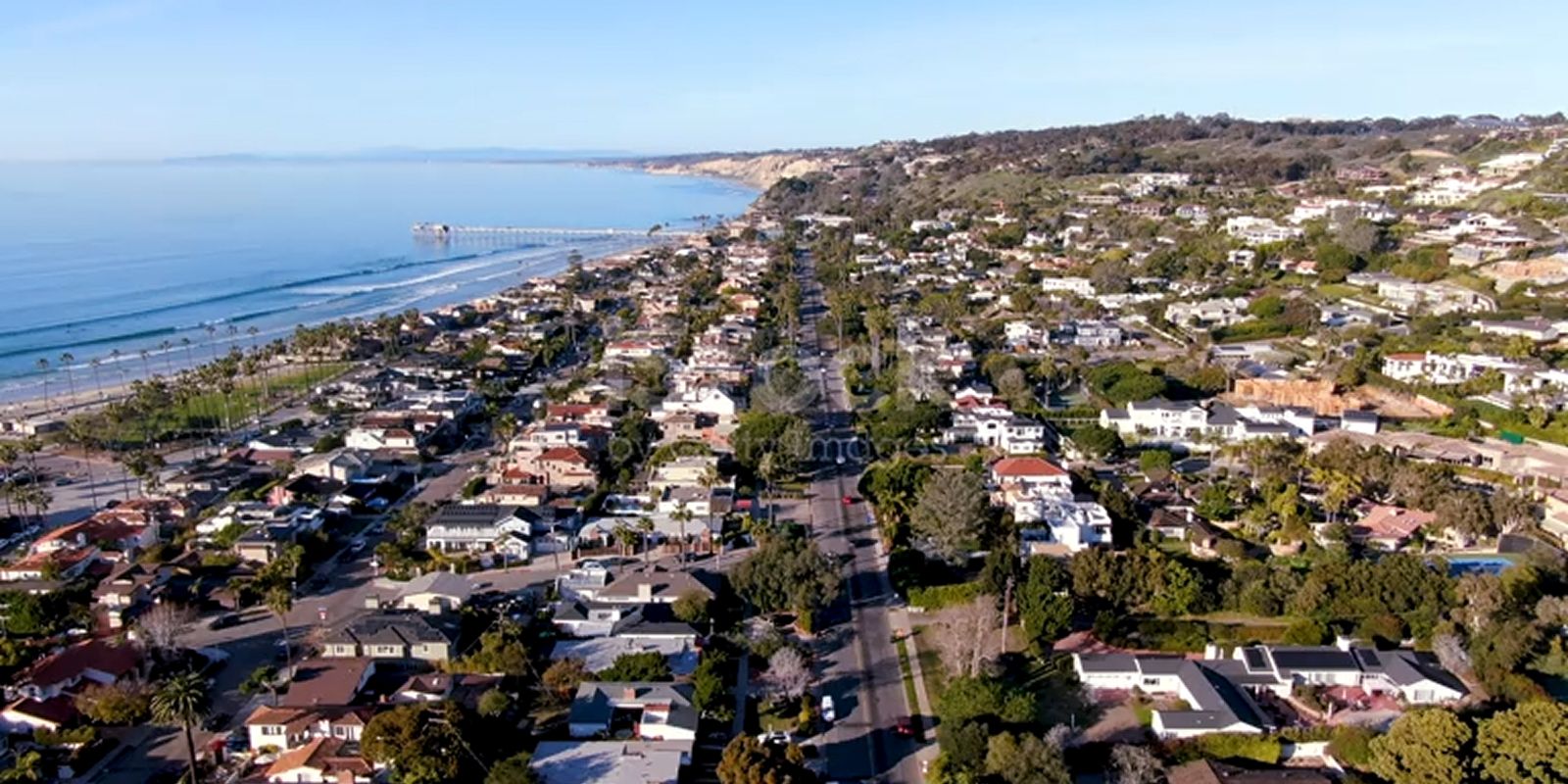 Coastal neighborhood with beach and ocean view.